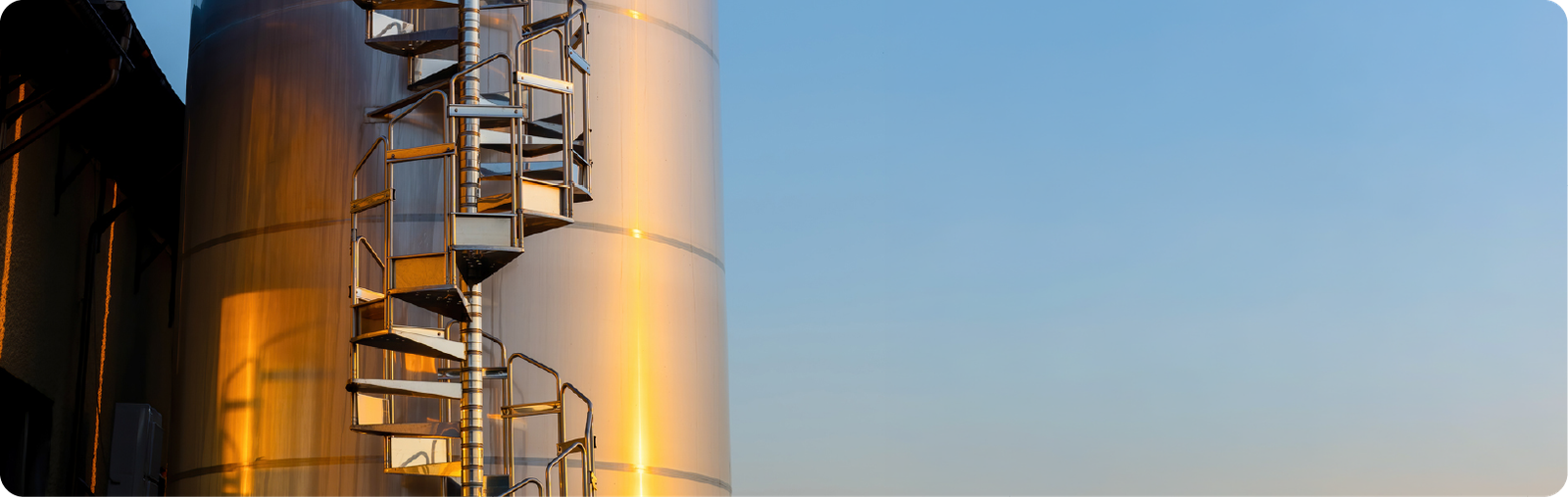 Industrial storage tank with spiral staircase